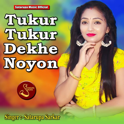 Tukur Tukur Dekhe Noyon