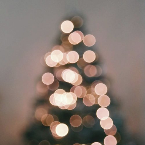 40 Essential Christmas and New Years Songs for Moments Underneath the Mistletoe._poster_image