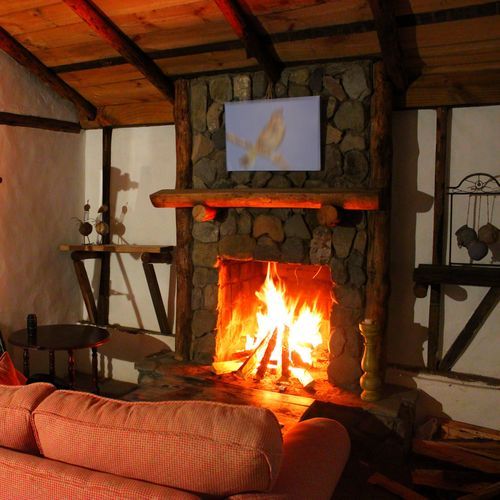 Vintage Living-Room with a Fireplace and a Pendulum Clock