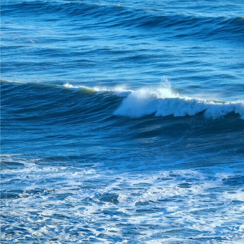 Waves on Pebble Beach_poster_image