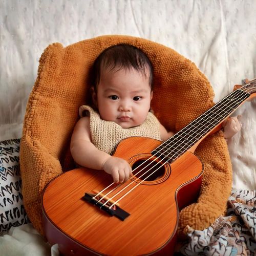 Gentle Cradle Strumming