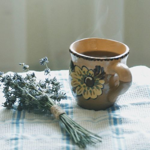 Bouquet of lavender and a cup