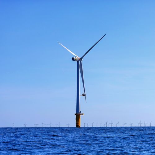 Wind Turbine on the Tranquility of the Sea