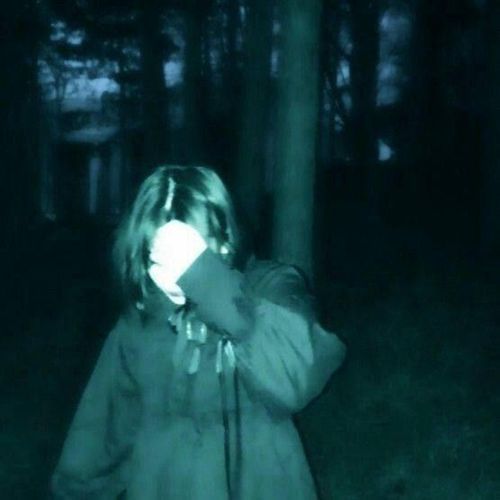 little girl in the forest.