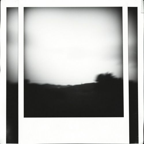 Fading Polaroid cover art