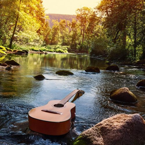 Ripple Tunes: Guitar Music over Water Sounds_poster_image