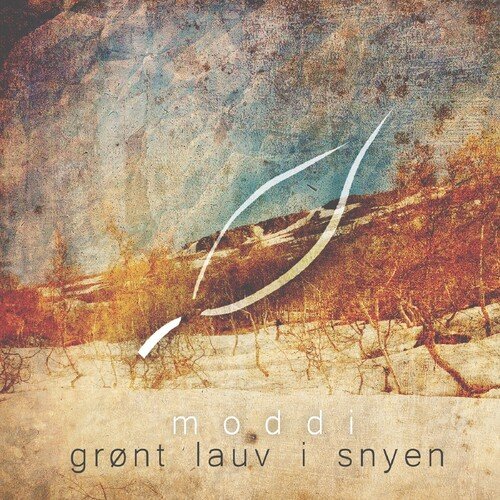 Grønt lauv i snyen