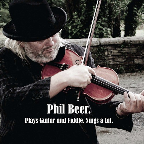 Plays Guitar and Fiddle Sings a Bit.